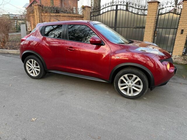 Червоний Ніссан Жук, об'ємом двигуна 1.6 л та пробігом 106 тис. км за 10390 $, фото 3 на Automoto.ua