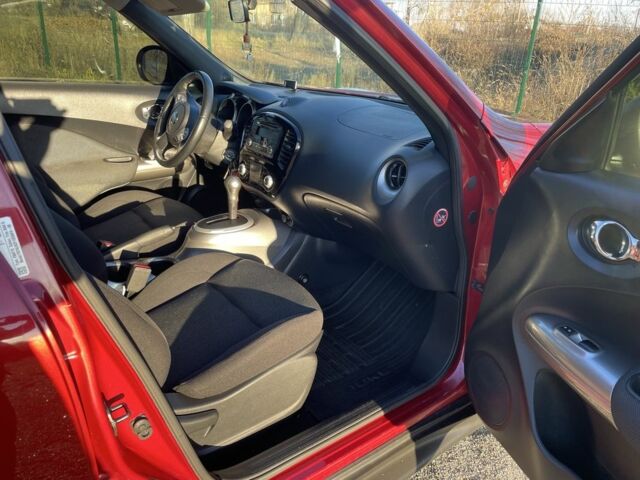 Червоний Ніссан Жук, об'ємом двигуна 1.6 л та пробігом 105 тис. км за 11300 $, фото 9 на Automoto.ua