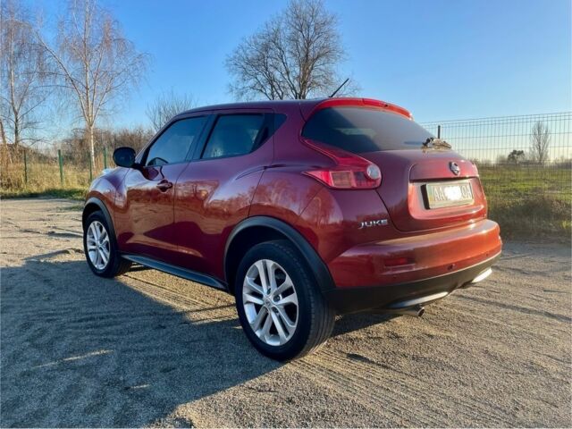 Червоний Ніссан Жук, об'ємом двигуна 1.6 л та пробігом 105 тис. км за 11300 $, фото 4 на Automoto.ua