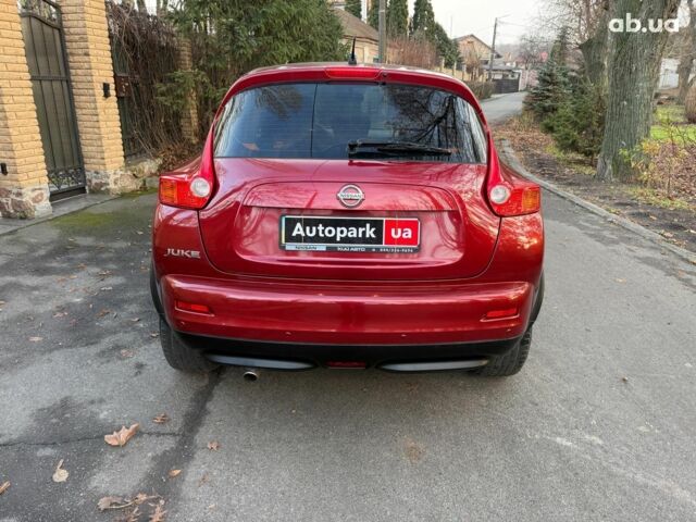 Червоний Ніссан Жук, об'ємом двигуна 1.6 л та пробігом 106 тис. км за 10390 $, фото 6 на Automoto.ua