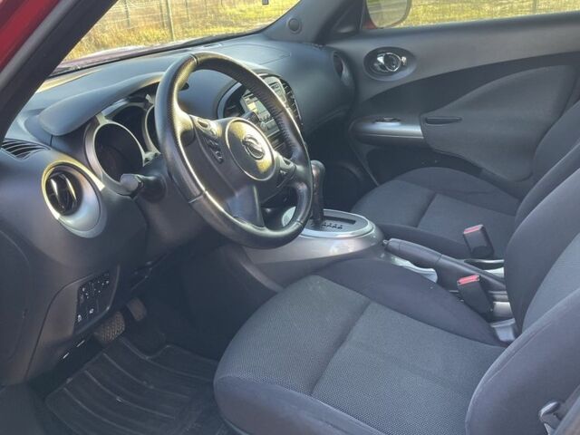 Червоний Ніссан Жук, об'ємом двигуна 1.6 л та пробігом 105 тис. км за 11300 $, фото 12 на Automoto.ua