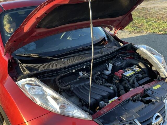 Червоний Ніссан Жук, об'ємом двигуна 1.6 л та пробігом 105 тис. км за 11300 $, фото 5 на Automoto.ua