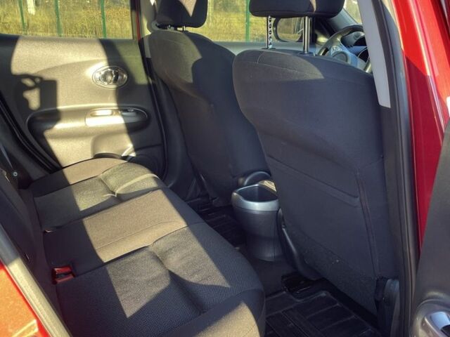 Червоний Ніссан Жук, об'ємом двигуна 1.6 л та пробігом 105 тис. км за 11300 $, фото 10 на Automoto.ua