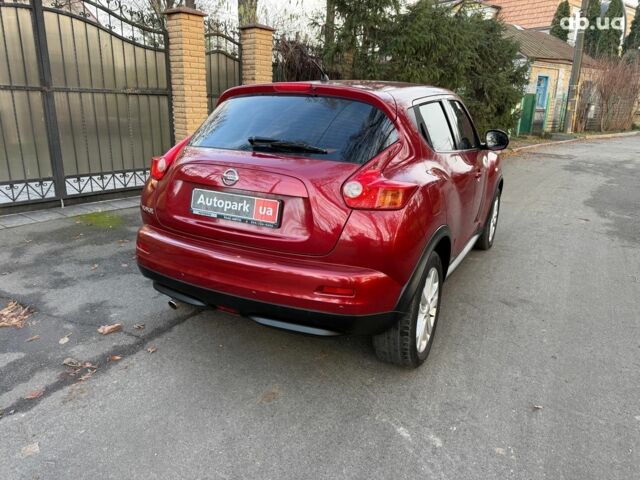Червоний Ніссан Жук, об'ємом двигуна 1.6 л та пробігом 106 тис. км за 10390 $, фото 5 на Automoto.ua