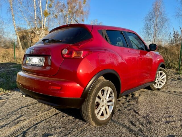 Червоний Ніссан Жук, об'ємом двигуна 1.6 л та пробігом 105 тис. км за 11300 $, фото 2 на Automoto.ua