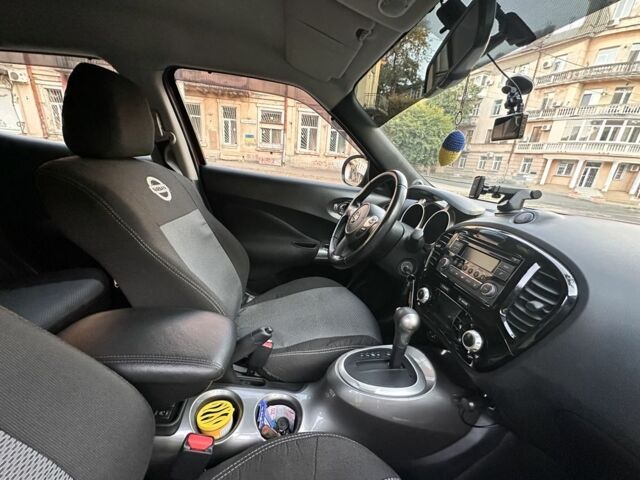 Червоний Ніссан Жук, об'ємом двигуна 1.6 л та пробігом 72 тис. км за 12199 $, фото 11 на Automoto.ua