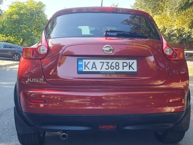 Красный Ниссан Жук, объемом двигателя 1.6 л и пробегом 135 тыс. км за 11500 $, фото 3 на Automoto.ua