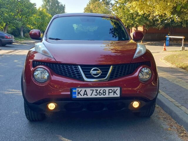 Красный Ниссан Жук, объемом двигателя 1.6 л и пробегом 135 тыс. км за 11500 $, фото 1 на Automoto.ua