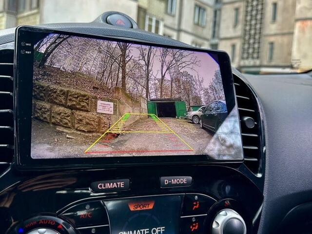 Червоний Ніссан Жук, об'ємом двигуна 1.6 л та пробігом 97 тис. км за 12000 $, фото 7 на Automoto.ua