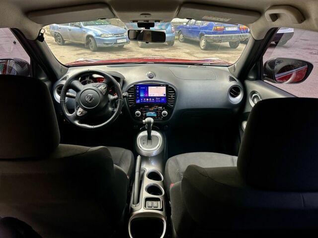 Червоний Ніссан Жук, об'ємом двигуна 1.6 л та пробігом 97 тис. км за 12000 $, фото 5 на Automoto.ua