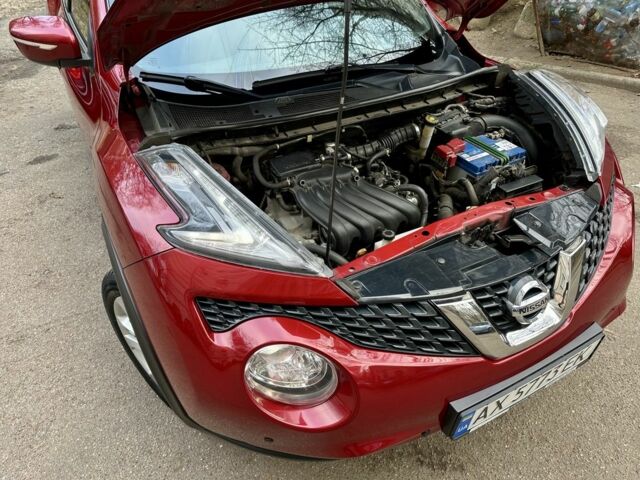 Червоний Ніссан Жук, об'ємом двигуна 1.6 л та пробігом 97 тис. км за 12000 $, фото 6 на Automoto.ua