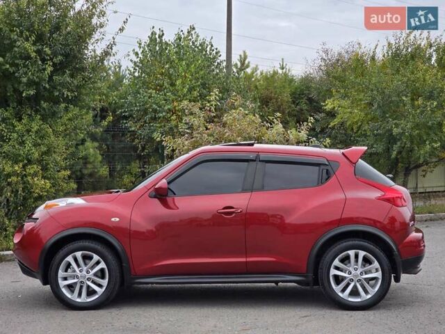 Красный Ниссан Жук, объемом двигателя 1.6 л и пробегом 216 тыс. км за 8999 $, фото 7 на Automoto.ua