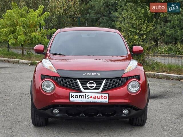 Красный Ниссан Жук, объемом двигателя 1.6 л и пробегом 216 тыс. км за 8999 $, фото 2 на Automoto.ua