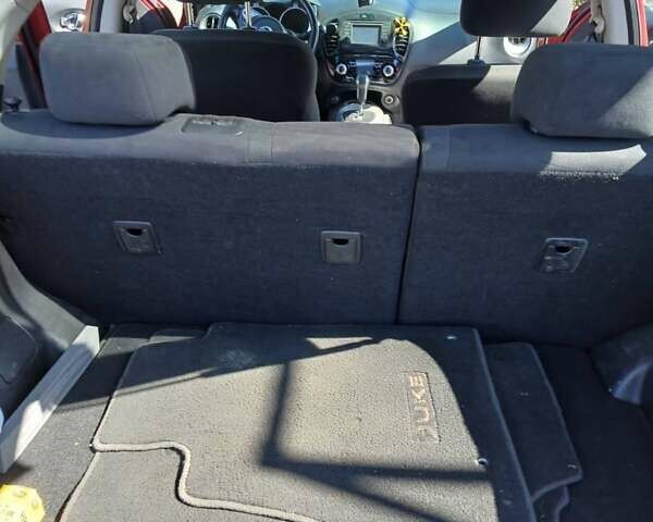 Красный Ниссан Жук, объемом двигателя 1.62 л и пробегом 170 тыс. км за 8999 $, фото 6 на Automoto.ua