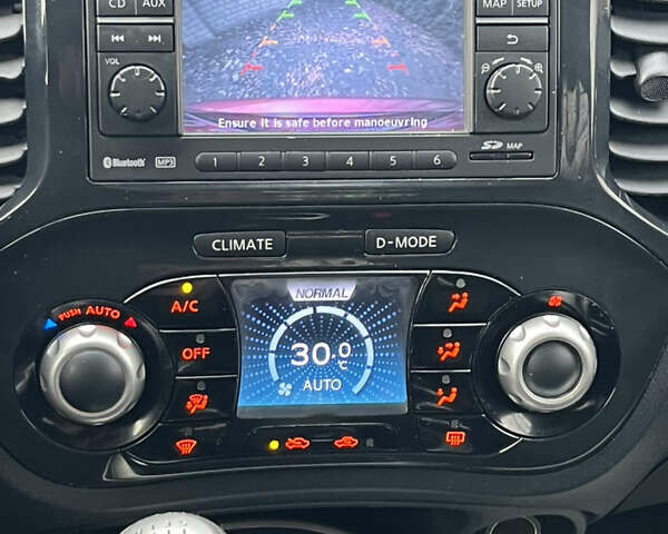 Красный Ниссан Жук, объемом двигателя 1.5 л и пробегом 195 тыс. км за 7750 $, фото 13 на Automoto.ua