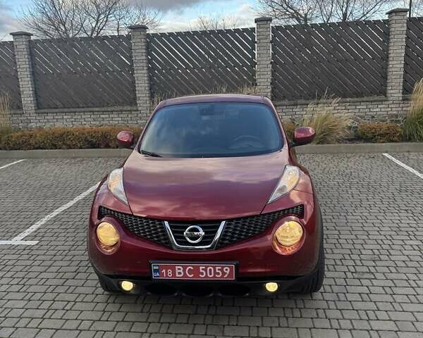 Красный Ниссан Жук, объемом двигателя 1.6 л и пробегом 99 тыс. км за 9887 $, фото 2 на Automoto.ua