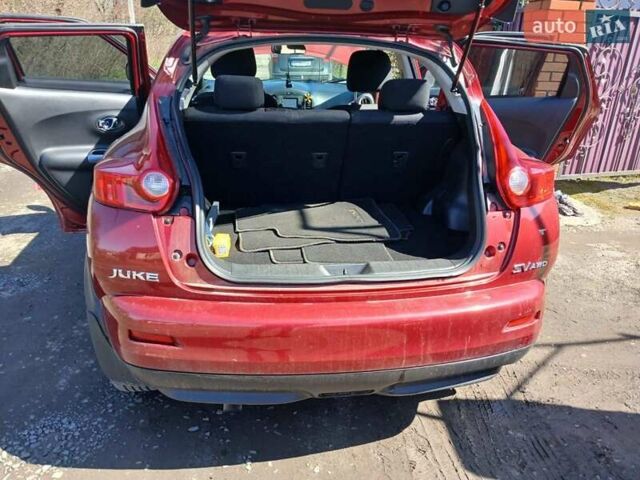 Красный Ниссан Жук, объемом двигателя 1.62 л и пробегом 170 тыс. км за 8999 $, фото 7 на Automoto.ua