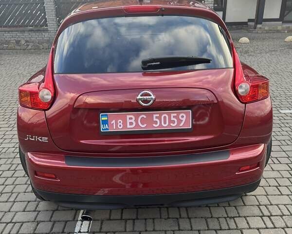 Красный Ниссан Жук, объемом двигателя 1.6 л и пробегом 99 тыс. км за 9887 $, фото 9 на Automoto.ua