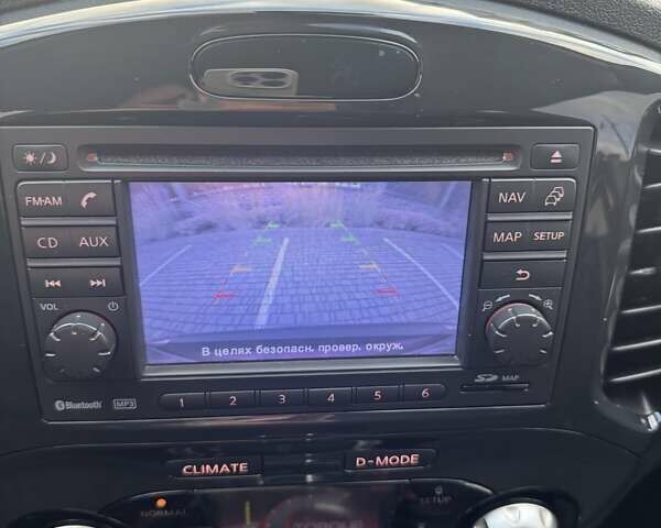 Красный Ниссан Жук, объемом двигателя 1.6 л и пробегом 99 тыс. км за 9887 $, фото 22 на Automoto.ua