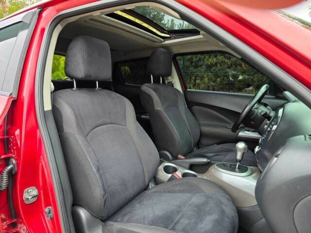 Красный Ниссан Жук, объемом двигателя 1.6 л и пробегом 216 тыс. км за 9499 $, фото 14 на Automoto.ua