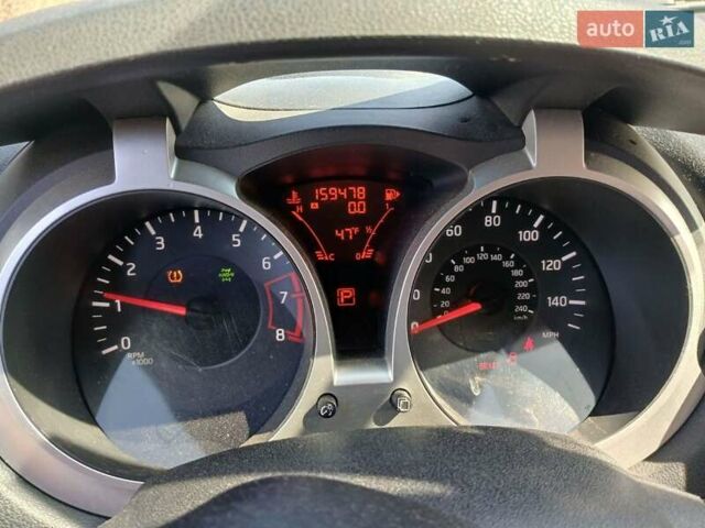Красный Ниссан Жук, объемом двигателя 1.6 л и пробегом 156 тыс. км за 8999 $, фото 20 на Automoto.ua