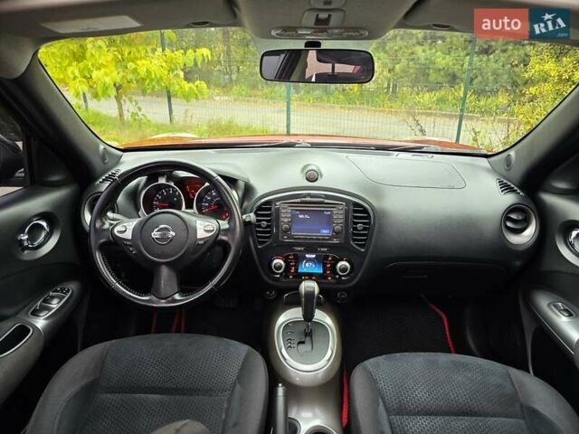Красный Ниссан Жук, объемом двигателя 1.6 л и пробегом 216 тыс. км за 8999 $, фото 1 на Automoto.ua