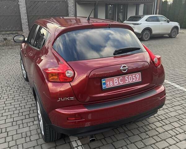 Красный Ниссан Жук, объемом двигателя 1.6 л и пробегом 99 тыс. км за 9887 $, фото 8 на Automoto.ua