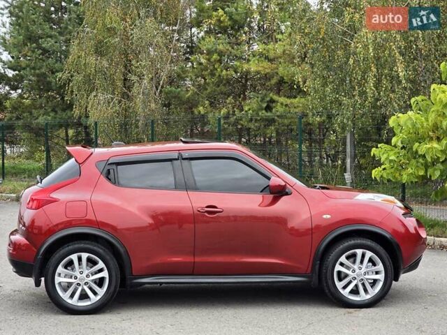 Красный Ниссан Жук, объемом двигателя 1.6 л и пробегом 216 тыс. км за 8999 $, фото 5 на Automoto.ua