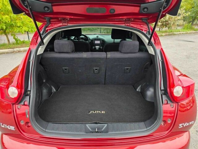 Красный Ниссан Жук, объемом двигателя 1.6 л и пробегом 216 тыс. км за 9499 $, фото 5 на Automoto.ua