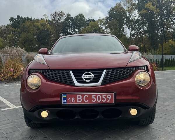 Красный Ниссан Жук, объемом двигателя 1.6 л и пробегом 98 тыс. км за 9988 $, фото 1 на Automoto.ua