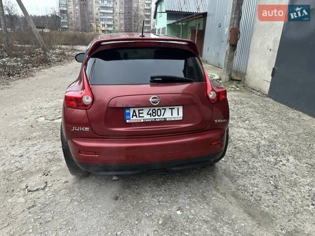 Красный Ниссан Жук, объемом двигателя 1.6 л и пробегом 136 тыс. км за 10000 $, фото 8 на Automoto.ua