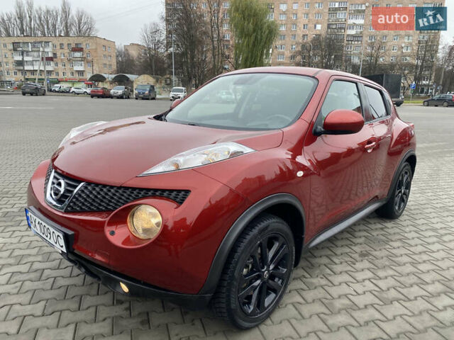 Красный Ниссан Жук, объемом двигателя 1.6 л и пробегом 119 тыс. км за 11000 $, фото 1 на Automoto.ua