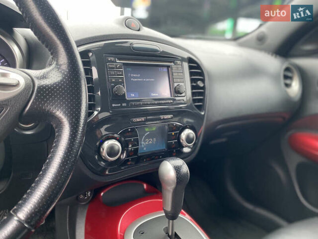 Красный Ниссан Жук, объемом двигателя 1.6 л и пробегом 119 тыс. км за 11000 $, фото 18 на Automoto.ua