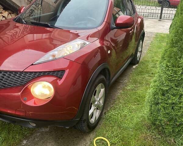 Красный Ниссан Жук, объемом двигателя 1.6 л и пробегом 243 тыс. км за 9800 $, фото 2 на Automoto.ua