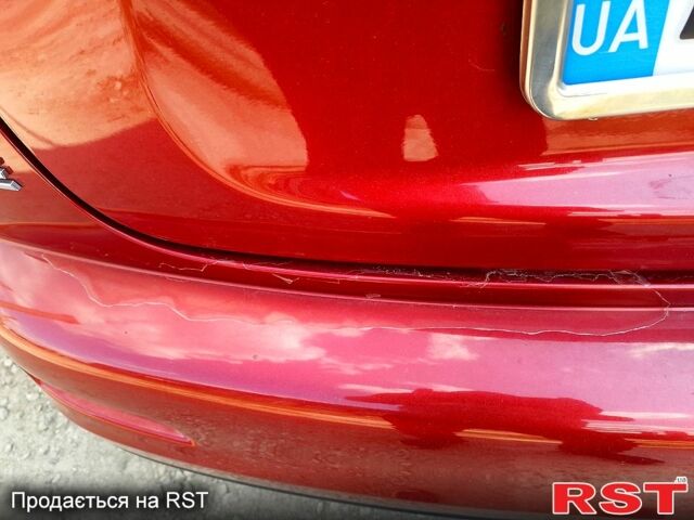 Красный Ниссан Жук, объемом двигателя 1.6 л и пробегом 117 тыс. км за 11100 $, фото 3 на Automoto.ua