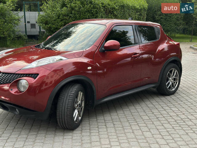 Червоний Ніссан Жук, об'ємом двигуна 1.6 л та пробігом 151 тис. км за 10000 $, фото 8 на Automoto.ua