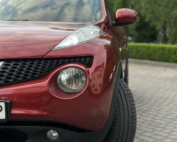 Червоний Ніссан Жук, об'ємом двигуна 1.6 л та пробігом 151 тис. км за 10000 $, фото 11 на Automoto.ua