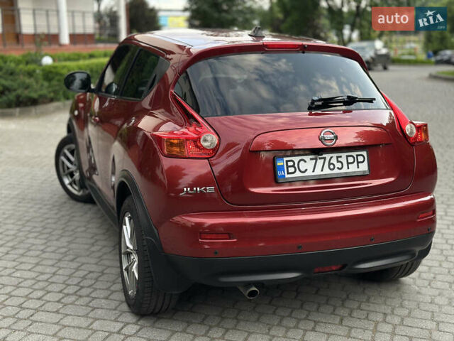 Червоний Ніссан Жук, об'ємом двигуна 1.6 л та пробігом 151 тис. км за 10000 $, фото 5 на Automoto.ua