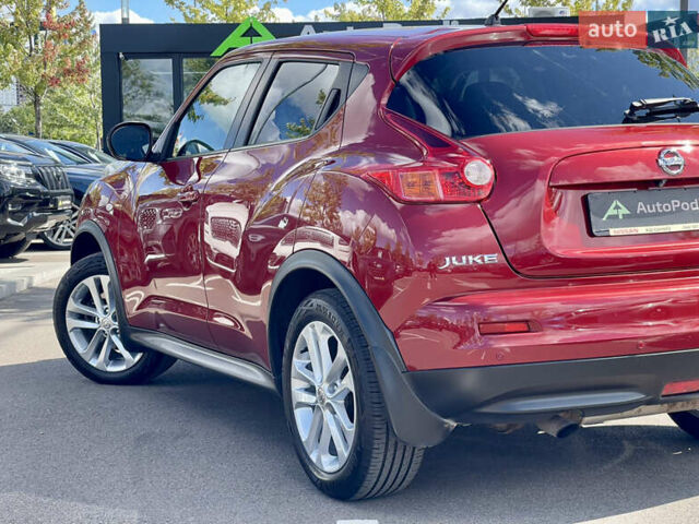 Красный Ниссан Жук, объемом двигателя 1.6 л и пробегом 91 тыс. км за 11500 $, фото 7 на Automoto.ua