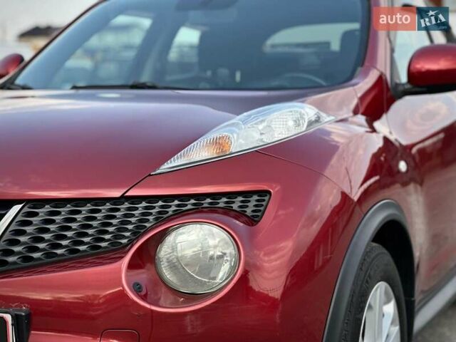 Червоний Ніссан Жук, об'ємом двигуна 1.6 л та пробігом 124 тис. км за 10200 $, фото 21 на Automoto.ua