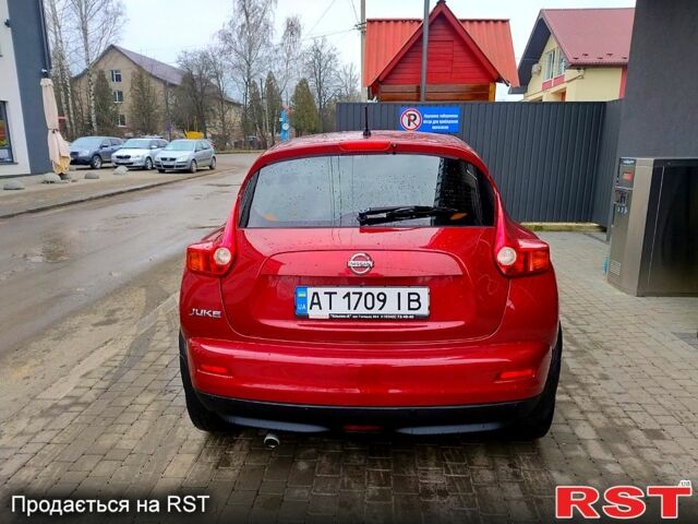 Красный Ниссан Жук, объемом двигателя 1.6 л и пробегом 134 тыс. км за 9600 $, фото 4 на Automoto.ua