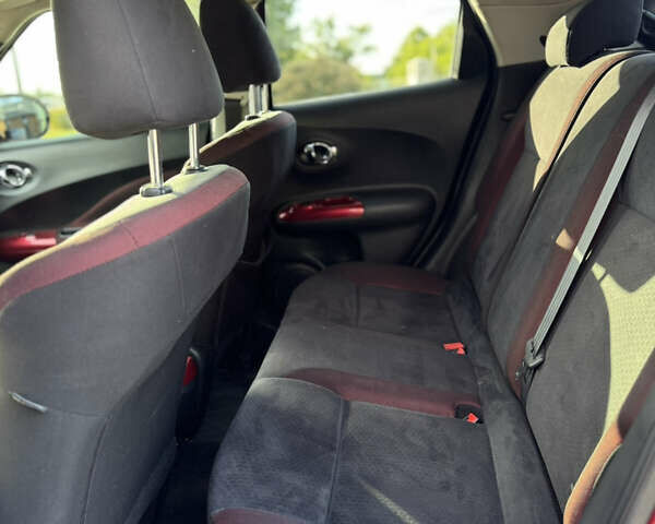 Красный Ниссан Жук, объемом двигателя 1.6 л и пробегом 144 тыс. км за 7899 $, фото 9 на Automoto.ua