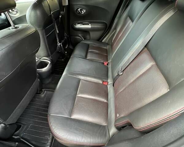 Красный Ниссан Жук, объемом двигателя 1.6 л и пробегом 160 тыс. км за 9797 $, фото 24 на Automoto.ua