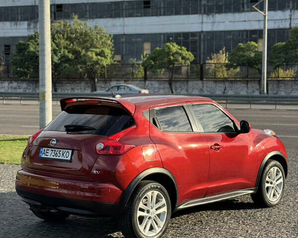 Красный Ниссан Жук, объемом двигателя 1.6 л и пробегом 144 тыс. км за 7899 $, фото 4 на Automoto.ua