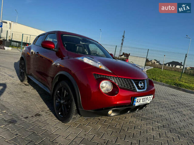 Красный Ниссан Жук, объемом двигателя 1.6 л и пробегом 119 тыс. км за 11700 $, фото 1 на Automoto.ua