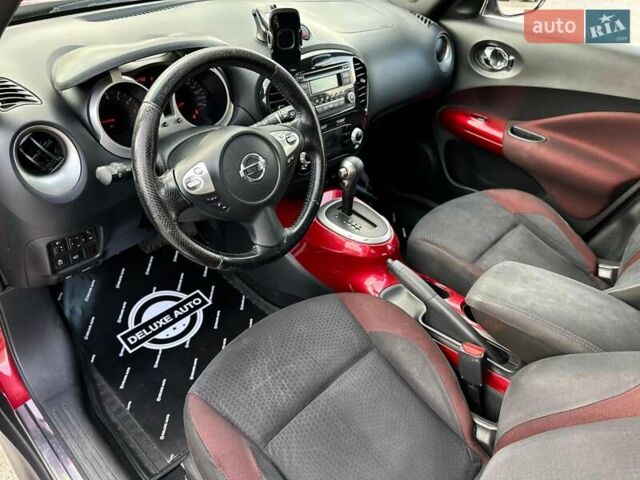 Червоний Ніссан Жук, об'ємом двигуна 1.6 л та пробігом 124 тис. км за 10200 $, фото 29 на Automoto.ua