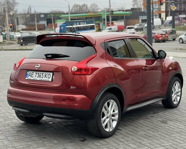 Червоний Ніссан Жук, об'ємом двигуна 1.6 л та пробігом 145 тис. км за 7700 $, фото 4 на Automoto.ua