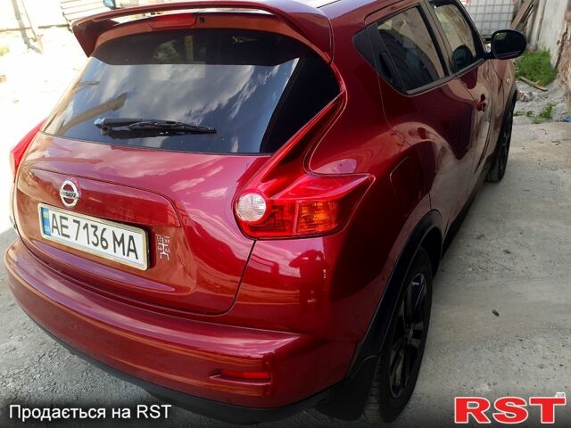 Красный Ниссан Жук, объемом двигателя 1.6 л и пробегом 117 тыс. км за 11100 $, фото 6 на Automoto.ua