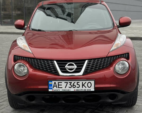 Червоний Ніссан Жук, об'ємом двигуна 1.6 л та пробігом 145 тис. км за 7700 $, фото 7 на Automoto.ua