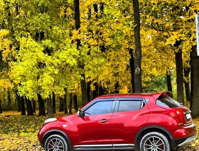 Красный Ниссан Жук, объемом двигателя 1.62 л и пробегом 131 тыс. км за 9900 $, фото 2 на Automoto.ua